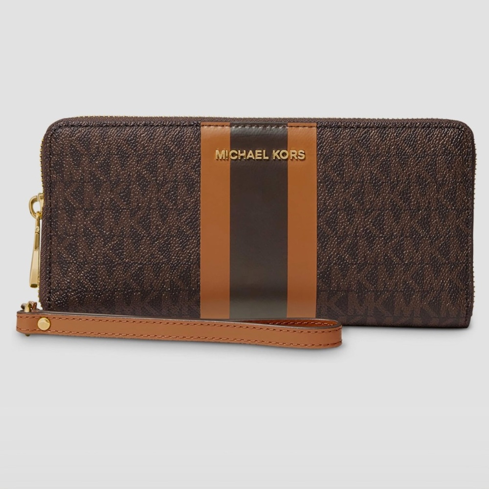Michael Kors Jet Set Travel Continental Brown.
8.25" W x 4" H x 1" D